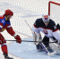 Russia's Radulov scores on Slovakia's goalie Laco on his team's first shootout attempt during their men's preliminary round ice hockey game at the Sochi 2014 Winter Olympic Games - Allelets.Ru